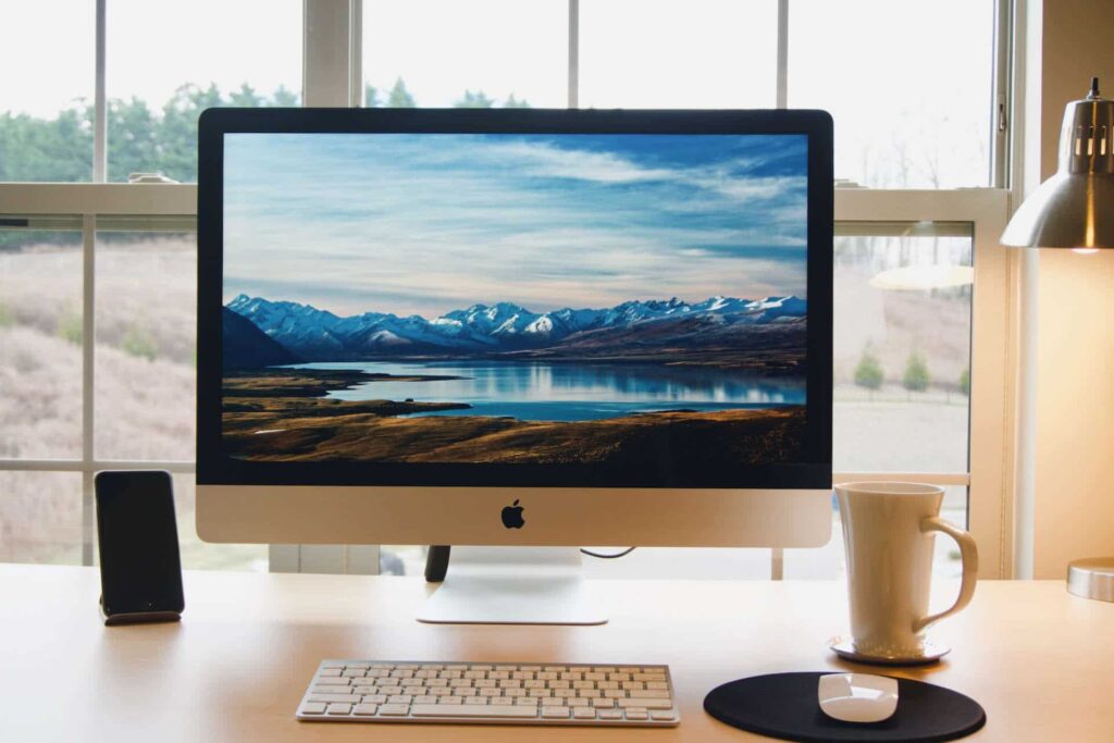 Desk lamp next to iMac